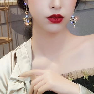 925 silver needle asymmetric star and moon earrings with gold plating and blue zircon