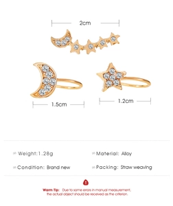 Detailed size guide for gold alloy star and moon clip-on earring set with rhinestones