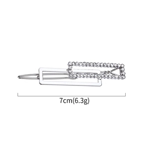 Detailed view of silver square rhinestone hair clip, 7cm length, polished metal finish