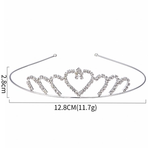 Sparkling silver rhinestone crown headband for girls featuring elegant heart patterns