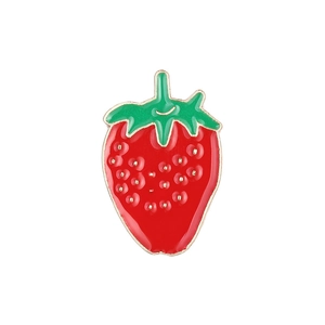 Cute strawberry enamel brooch in red and green with golden metal trim on white background
