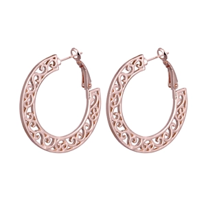 Bohemian rose gold hollow circular earrings with intricate floral cutout patterns