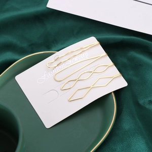 Lot de 4 barrettes à cheveux minimalistes en métal doré aux formes géométriques