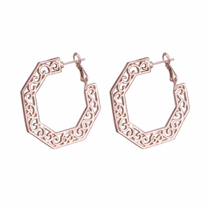 Elegant rose gold hollow geometric earrings with baroque scrollwork on white background