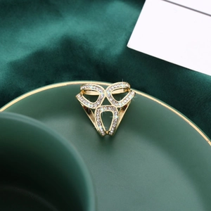 Golden geometric triple-layer hollow ring with pave-set shimmering crystals