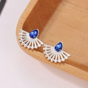 Elegant fan-shaped silver stud earrings with teardrop blue crystal for women