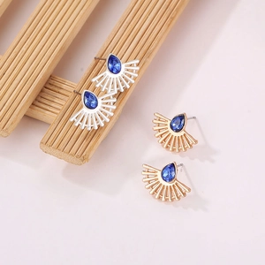 Fashionable fan-shaped earrings with blue teardrop gemstone in gold and silver finish