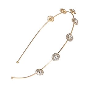 Elegant gold thin headband featuring seven clear rhinestone flower petal ornaments