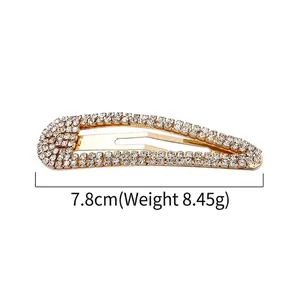 Sparkling double-row rhinestone water-drop BB hair clip in gold finish, 7.8cm long
