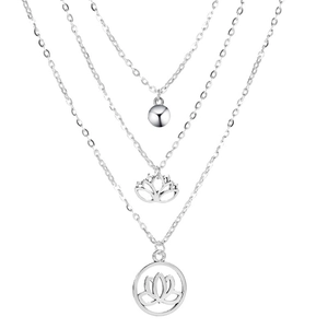 Three-layer silver lotus necklace set featuring bead and cutout flower pendants
