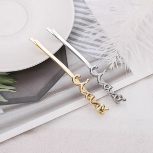 Barrettes à cheveux minimalistes dorées et argentées en forme de vagues élégantes
