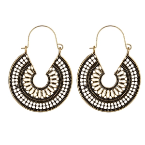Bohemian vintage hollow metal earrings in antique bronze gold with intricate filigree pattern