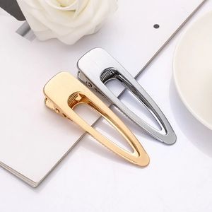Set di fermagli per capelli minimalisti oro e argento con texture in metallo spazzolato
