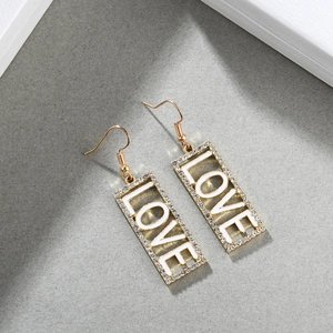 Golden LOVE rectangle drop earrings with white enamel inlay and zircon accents