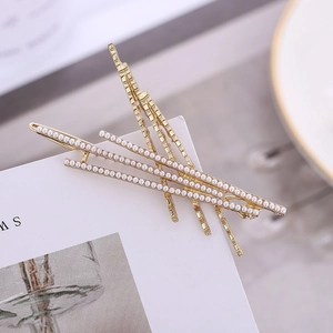 Elegante Haarklammern aus Gold mit parallelen Perlenreihen und minimalistischer Textur