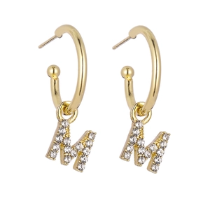Golden letter M earrings with sparkling rhinestones on a white background for women