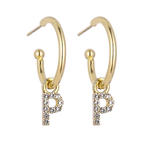 Detail of gold letter P earrings with sparkling rhinestones on a clean white background