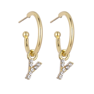 Detail of gold letter Y hoop earrings with sparkling cubic zirconia pavé stones