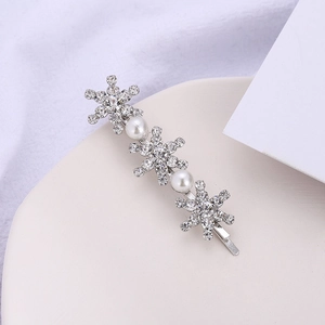 Barrette élégante avec flocons de neige, strass et perles sur support en céramique