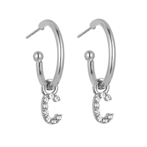 Detailed view of silver letter C drop earrings featuring sparkling cubic zirconia stones