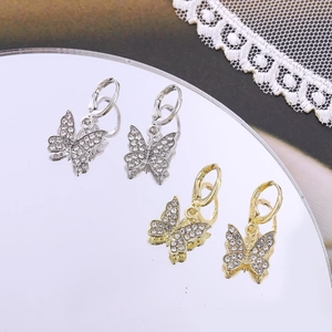 Boucles d'oreilles papillon élégantes en or et argent avec ailes en cristal brillant