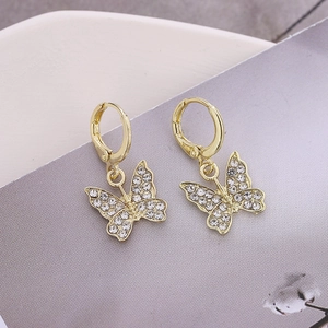Boucles d'oreilles papillon dorées à la mode avec strass brillants et crochets d'oreille