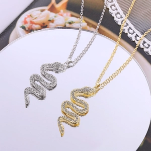 Fashion snake pendant necklaces in gold and silver finish with sparkling crystal pave