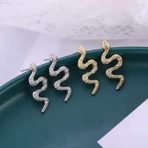 Elegant long snake-shaped stud earrings in silver and gold with realistic scale texture