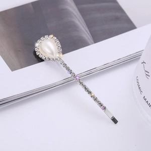 Elegant silver hair clip with large pearly teardrop and sparkling crystal pavé details