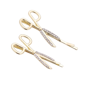 Paire de pinces à cheveux créatives en forme de ciseaux dorés avec strass brillants