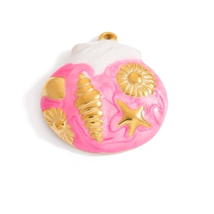 Macro detail of enamel shell pendant with gold starfish and seashell metal charms
