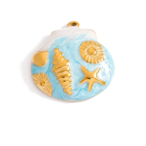 Macro shot of gold stainless steel shell pendant with blue enamel and starfish details