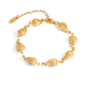 Elegant 18K gold plated stainless steel shell bracelet with textured ocean style links