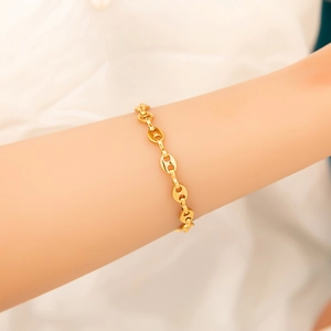 Elegant 18K gold plated stainless steel interlocking link bracelet worn on a wrist