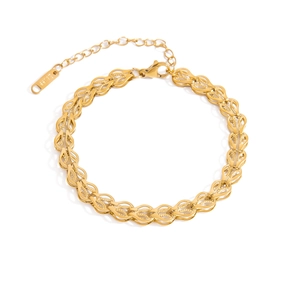 Detail of 18K gold stainless steel bracelet showing interlocking textured links and S.Steel tag