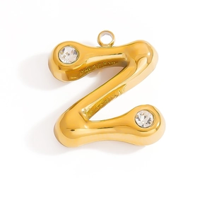 Close-up of 18K gold-plated letter Z pendant with small round crystals at both ends