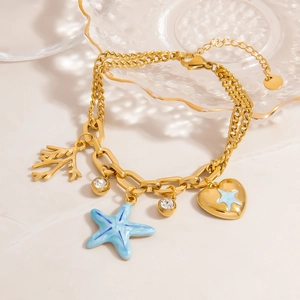 Bracelet double chaîne élégant en acier doré avec pendentifs étoile de mer et corail