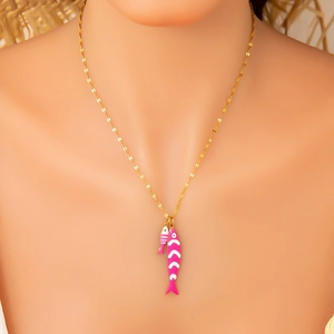 Detail of 18K gold sequin chain with colorful enamel double fish pendant on neck