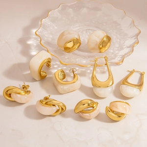 French vintage titanium steel gold earrings with white resin and minimalist marble design