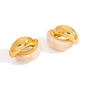 Modern U-shaped drop earrings in gold metal with cream marble texture resin detail