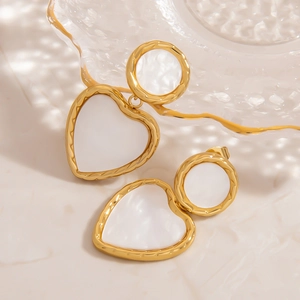 French vintage gold heart earrings with white pearl inlay and twisted rope edge texture