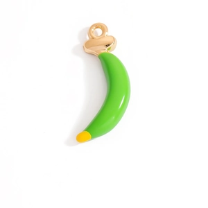 Detail showing a creative banana-shaped enamel charm with golden metal hanging ring