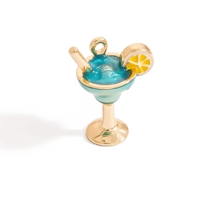 Detail of cocktail glass pendant with blue enamel, lemon slice and gold straw accent