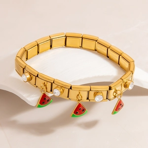 Italian style gold charm bracelet with watermelon pendants and sparkling white rhinestones