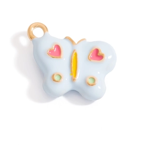 Detail of light blue butterfly pendant with pink hearts for DIY jewelry making