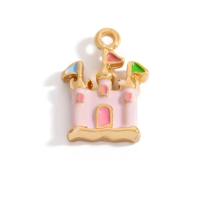 Macro shot of a pink enamel castle pendant with colorful flags and gold alloy plating