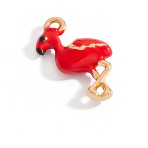 Detail of golden flamingo charm pendant with vibrant red enamel for DIY jewelry making