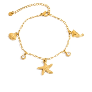 Detailed view of golden ocean-themed bracelet with starfish and dolphin charms
