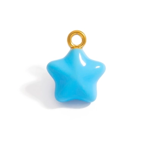Detailed view of blue enamel star pendant with a gold metal loop on a white background
