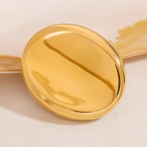 Detailed close-up of polished gold-plated stainless steel brooch with mirror finish